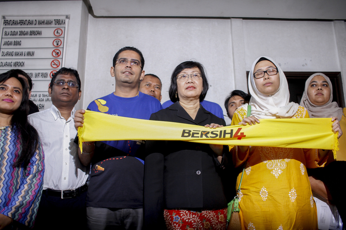 Bersih 2.0 chairman Maria Chin Abdullah (third from right) and committee members at the Shah Alam High Court. The court says the home minister can declare Bersih 4 t-shirts and related printed matter illegal on the basis of preserving the peace in a multi-racial country. – The Malaysian Insider pic by Seth Akmal, February 19, 2016.