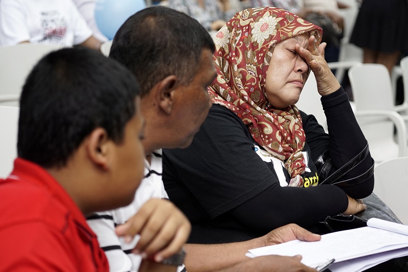 Relatives of passengers onboard the missing MH370 flight at a remembrance day event at a Kuala Lumpur mall. Four more families have decided to sue MAS over the plane's disappearance – The Malaysian Insider pic by Najjua Zulkefli, March 7, 2016.