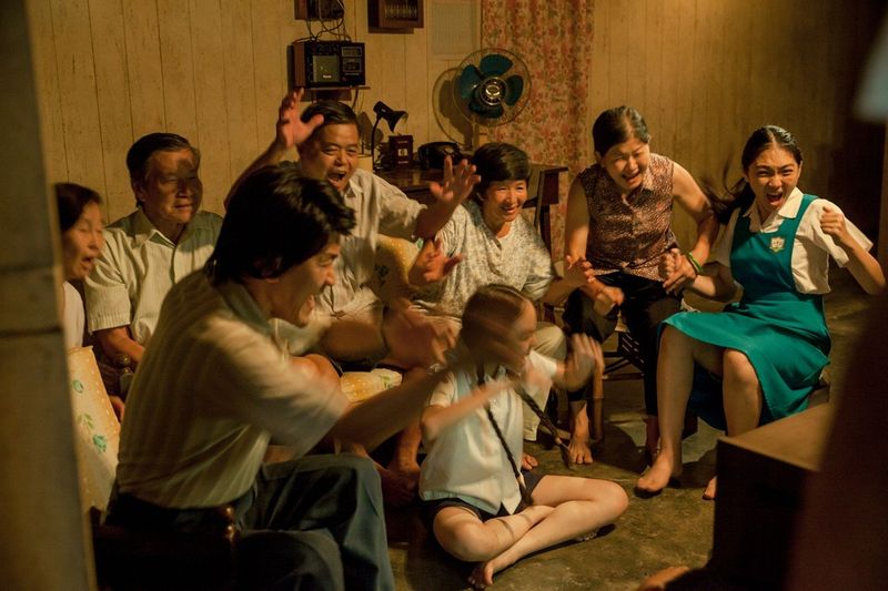 Captain and 'tauke' Chow Kwok Keong's family are glued to the TV to watch the final match against South Korea. – Pic courtesy of Woohoo productions, January 28, 2016.