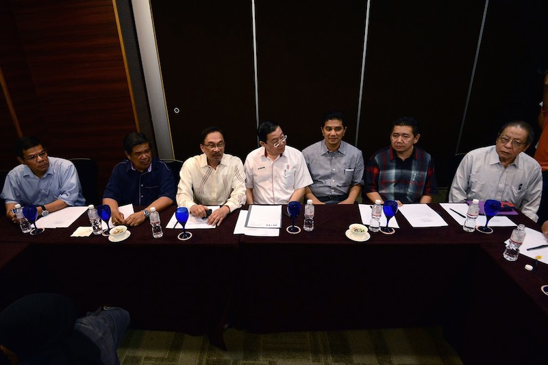 The Pakatan Rakyat leadership council is scheduled to meet tomorrow to decide on the fate of opposition leader Datuk Seri Anwar Ibrahim (third from left) whose sodomy verdict is expected on Tueday but a few leaders have been squabbling openly about hudud and local council elections. – The Malaysian Insider file pic, February 7, 2015.