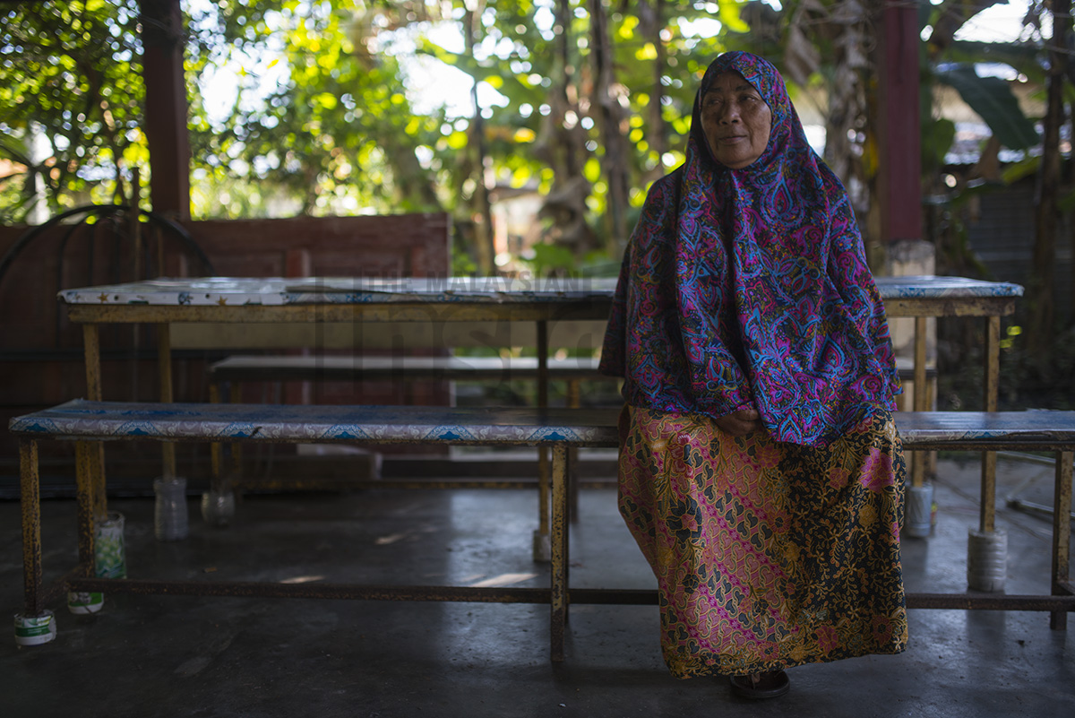 Housewife Siti Minah Mahmud, 64, lost her mother-in-law on December 26, 2004. The 75-year-old drowned in her home during the tsunami. – The Malaysian Insider pic by Hasnoor Hussain, December 26, 2014.