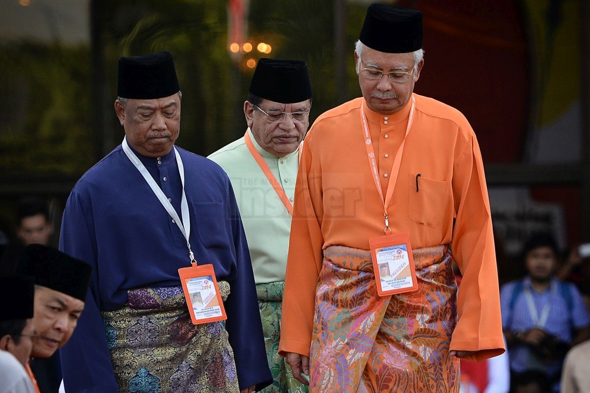 Presiden Umno Datuk Seri Najib Razak ketika tiba di perkarangan Pusat Dagangan Dunia Putra, Kuala Lumpur, pagi tadi bagi merasmikan Perhimpunan Agung Umno 2014. – Gambar The Malaysian Insider oleh Afif Abd Halim, 27 November, 2014.