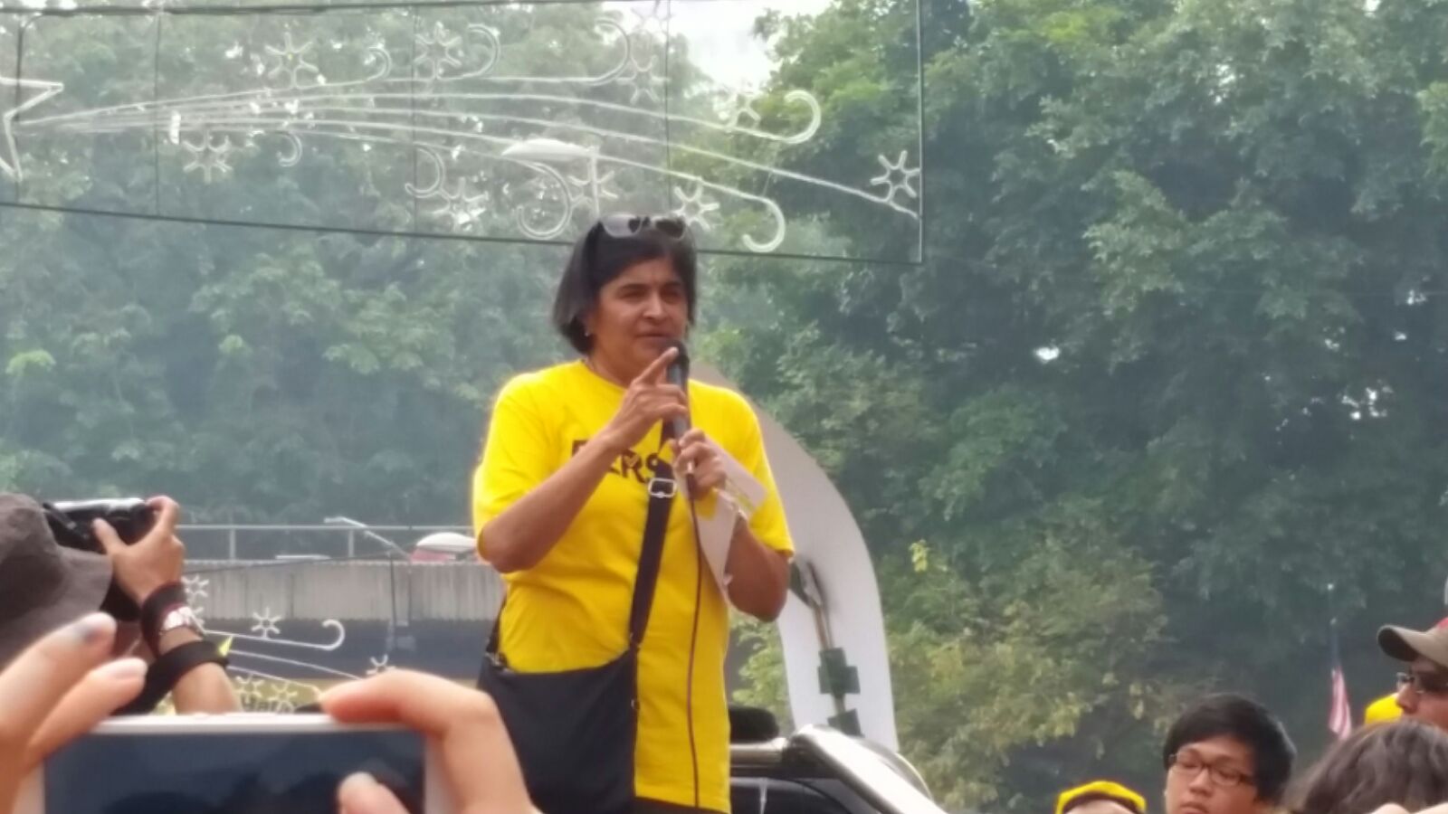 Datuk Ambiga Sreenevasan takes to a makeshift stage to address the crowd. – The Malaysian Insider pic, August 30, 2015.