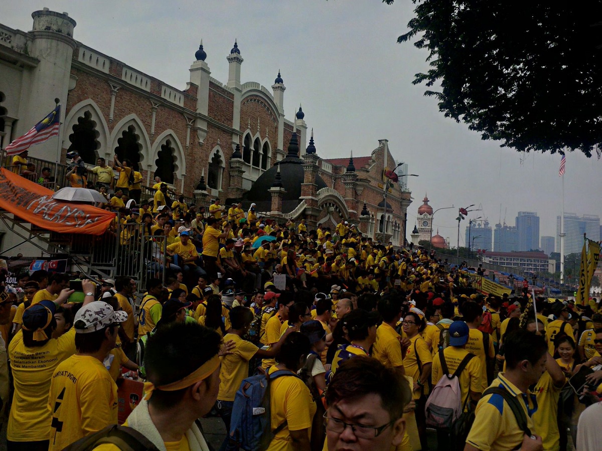 Bersih 4 protesters take up some of the seats erected for tomorrow's Merdeka celebrations. – The Malaysian Insider pic, August 30, 2015.