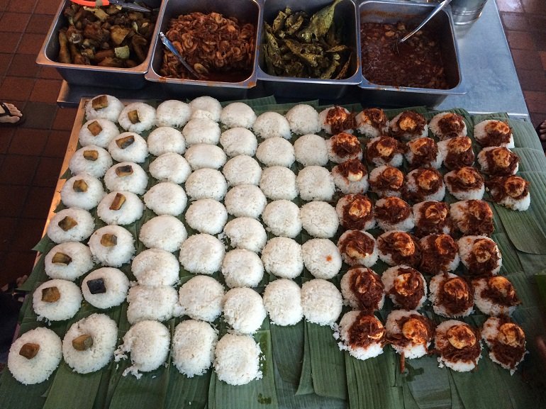 Piles of nasi lemak waiting to be topped with condiments and delicious hot sambal. – HungryGoWhere pic, December 7, 2015.