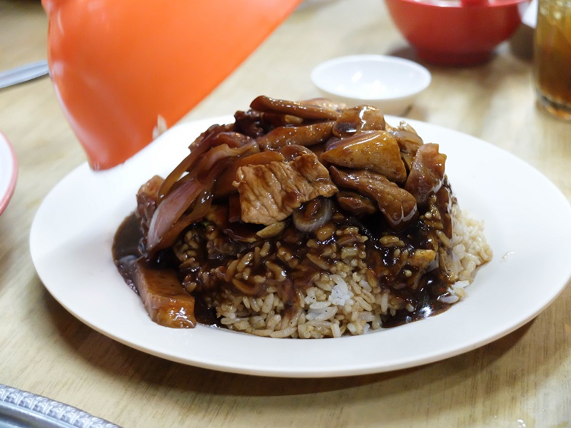 One of the joys of ordering Sin Kee's 'mun fan' is taking off the bowl to reveal a perfect mound of braised rice. – The Malaysian Insider pic by Yap Pik Kuan, November 24, 2015.