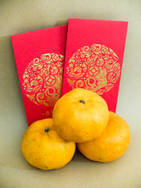 Mandarin oranges and ang pow are a few of Chinese New Year's festive items. – The Malaysian Insider file pic, February 3, 2016. 