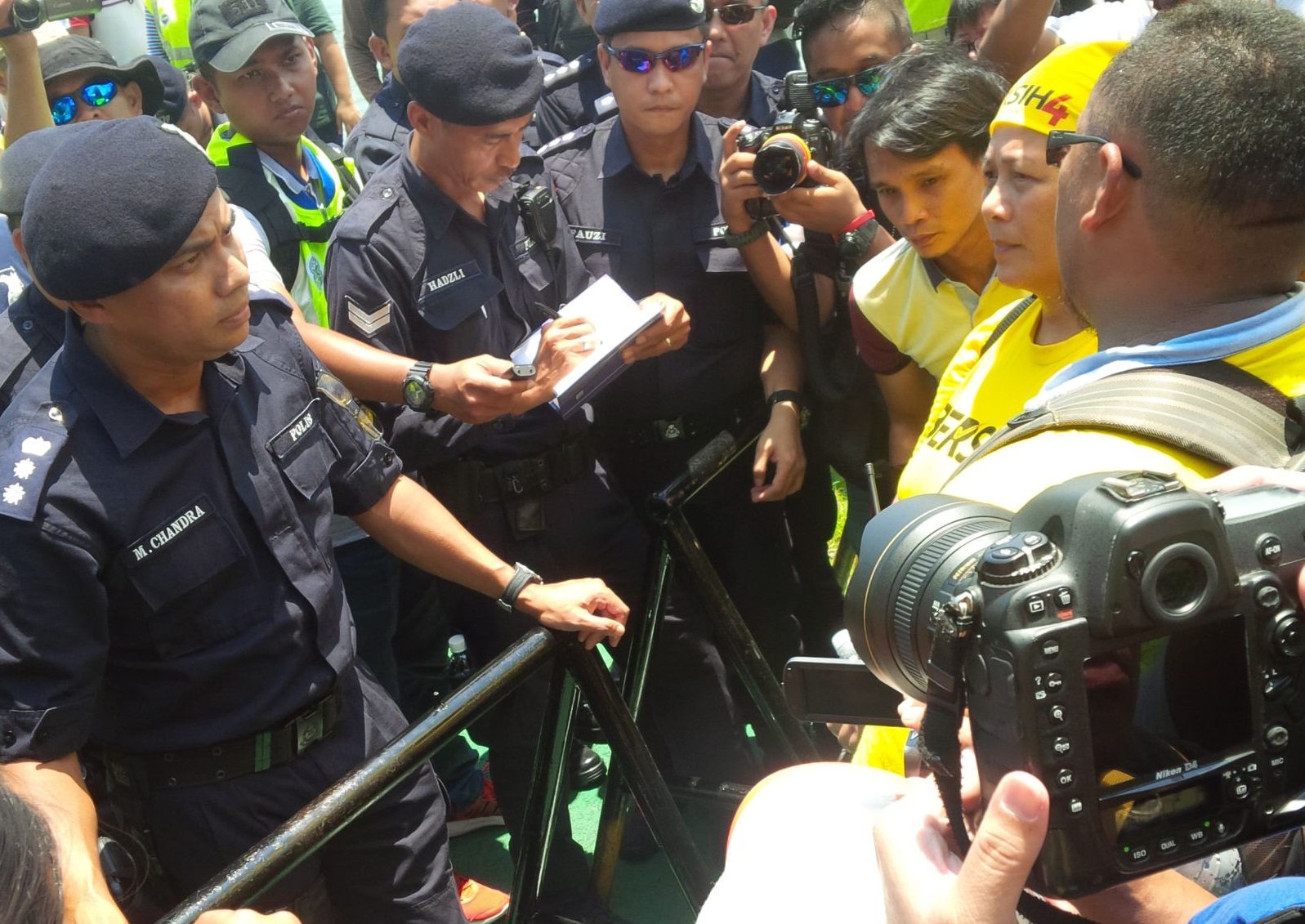 Sabah Bersih chairman Jannie Lasimbang asking the police to let the democracy walk proceed to Kota Kinabalu city centre. – The Malaysian Insider pic, August 30, 2015.