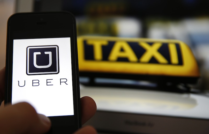 Beginning October 1, individuals or companies offering transport services using the Uber application could be fined or jailed, while private vehicles will be impounded. – Reuters pic, September 22, 2014.