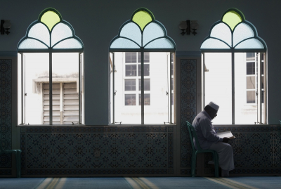 A man reads Quran at a mosque in downtown Kuala Lumpur. The Malaysian Insider/Nazir Sufari